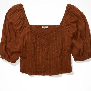 AE Short blouse with puff sleeves and honeycomb embroidery worn only 1time sizes